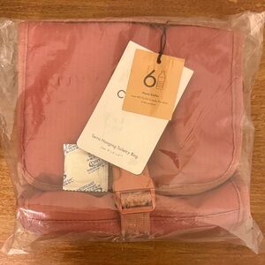 Calpak Terra Hanging Toiletry Bag in Pink